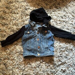 Little Bipsy denim jacket with black sleeve and hood. 6-12mos